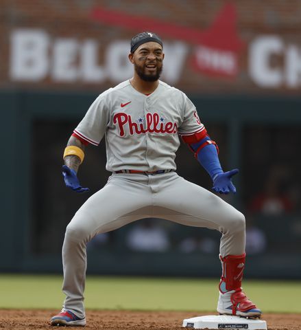 Philadelphia Phillies' Edmundo Sosa reacts after hitting a double during the second inning of game one of the baseball playoff series between the Braves and the Phillies at Truist Park in Atlanta on Tuesday, October 11, 2022. (Jason Getz / Jason.Getz@ajc.com)