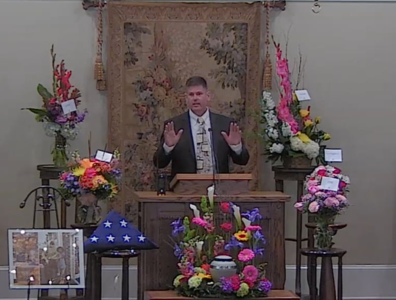 Jason Rogers spoke at his wife's funeral.