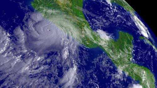 IN SPACE - AUGUST 30:  In this satellite image provided by the National Oceanic and Atmospheric Administration, Hurricane John is shown at 10:15am EDT southwest of Mexico's coast August 30, 2006.  (Photo by NOAA via Getty Images)