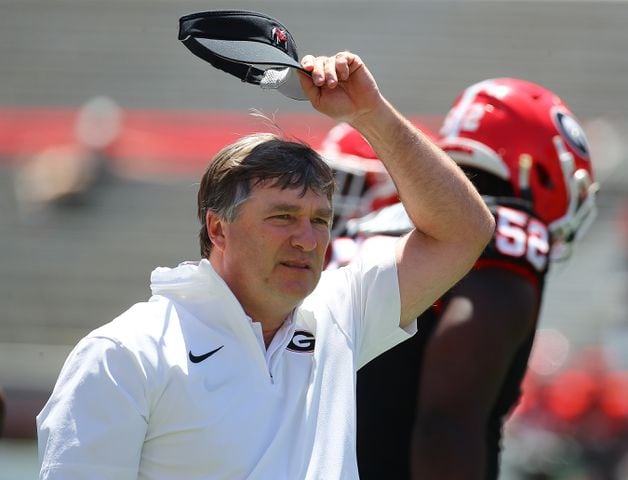 Head coach Kirby Smart tips his visor during the G-Day game.  Curtis Compton for the Atlanta Journal Constitution