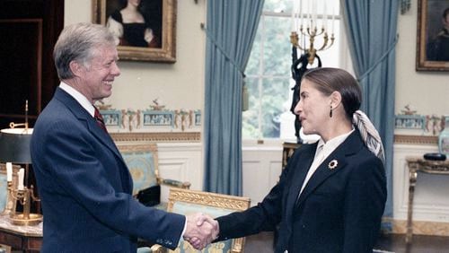 President Jimmy Carter with Ruth Bader Ginsburg in 1980  at the White House. Carter appointed Ginsburg as a federal judge on the U.S. Court of Appeals in 1980. Ginsburg was named to the Supreme Court by Bill Clinton in 1993.