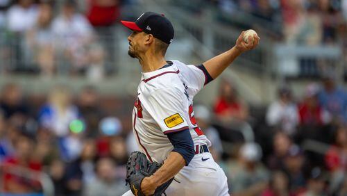 Braves starting pitcher Charlie Morton (50) throws a pitch to a Chicago Cubs batter during the first inning at Truist Park on Wednesday, May 15, 2024. (Arvin Temkar / AJC)