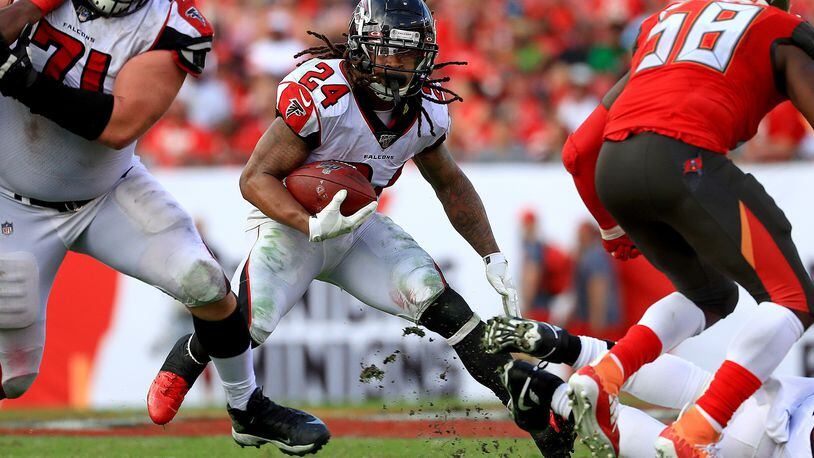 Atlanta Falcons running back Devonta Freeman (24) carries the ball against the Tampa Bay Buccaneers at Raymond James Stadium in Tampa, Florida, on December 29, 2019. (Mike Ehrmann/Getty Images/TNS)
