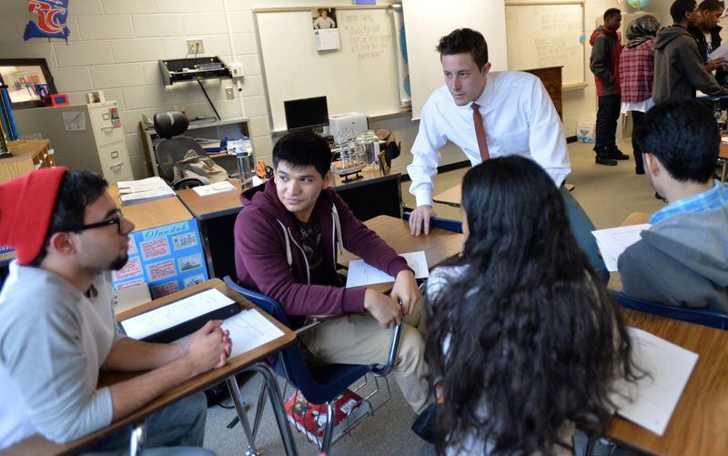 Lawrenceville - Andy Dugger, interacts with students during his AP US History class at Central Gwinnett High School in Lawrenceville on Thursday, January 15, 2015. HYOSUB SHIN / HSHIN@AJC.COM