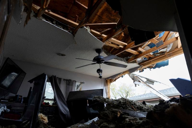 Damage is seen to Justin and Amanda Putnam's bedroom after a severe storm damaged their neighborhood in Council Bluffs, Iowa, on Friday, April 26, 2024. (Anna Reed/Omaha World-Herald via AP)