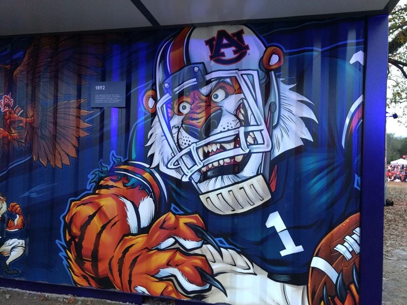 Auburn had equal billing. The left side of the Chick-fil-A stand was decorated for Georgia, the right side for Auburn.