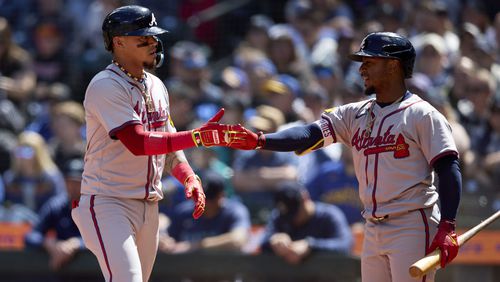 Atlanta Braves' Orlando Arcia rounds third on the way to score against the Atlanta Braves during the fourth inning of a baseball game, Wednesday, May 1, 2024, in Seattle. (AP Photo/John Froschauer)