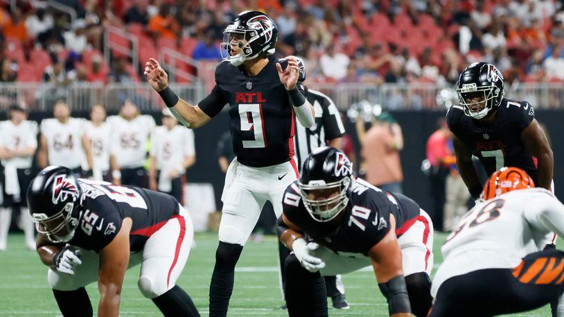 Falcons quarterback Desmond Ridder (9) calls for a play during the first half in a preseason exhibition game against the Cincinnati Bengals at Mercedes-Benz Stadium on Friday, August 18, 2023, in Atlanta.Miguel Martinezmiguel.martinezjimenez@ajc.com