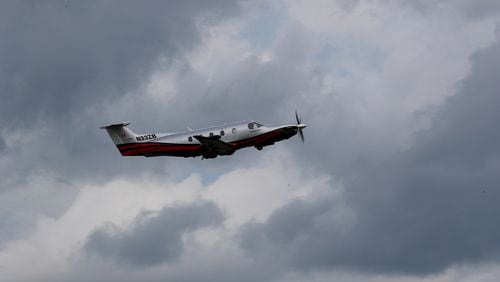 A plane takes off from DeKalb Peachtree Airport.