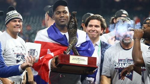 The MVP Jorge Soler holds his trophy after beating the Astros in game 6 to win the World Series on Tuesday, Nov. 2, 2021, in Houston.   “Curtis Compton / Curtis.Compton@ajc.com”