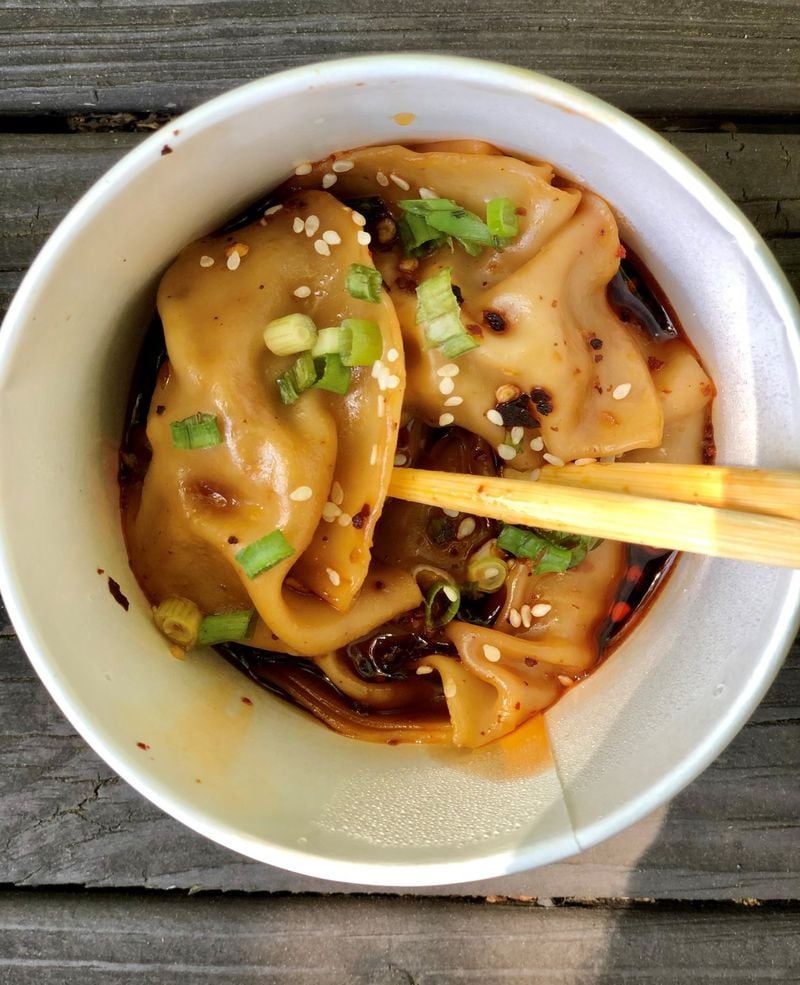 This half order of pork dumplings Gu’s Kitchen features zhong-style sweet and spicy sauce. Wendell Brock for The Atlanta Journal-Constitution