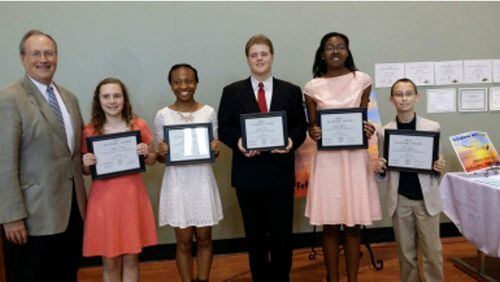 Joseph Barrow, Fayette County Superintendent of Schools, and The Fayette County Retired Educators recognized outstanding middle school students: from left, Carryanne Wilson, Booth; Jada Brooks, Bennett’s Mill; Marcus Phelps, Flat Rock; Athena Higgins, Rising Starr; Jason Gordon, Whitewater.