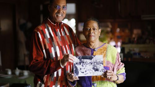 Morocco and Paula Coleman hold a 1948 photograph from when they met as toddlers at the nursery at Spelman College. They reunited years later, married in 1991and their relationship lasted for decades. Miguel Martinez / miguel.martinezjimenez@ajc.com