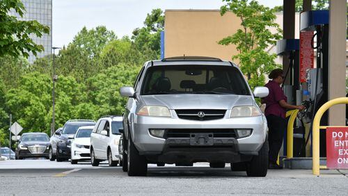 Customers wait their turn to fill up at an Atlanta Sam's Club on Clairmont road on Tuesday, May 11, 2021. Despite reports of gasoline shortages scattered throughout the Southeast on Tuesday morning because of a cybertattack involving Colonial Pipeline, industry analysts and experts are warning against panic buying and hoarding of gasoline. (Hyosub Shin / Hyosub.Shin@ajc.com)