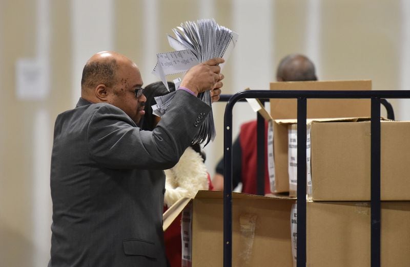 December 14, 2017 Atlanta - Ralph Jones, registration manager prepares to recount the votes cast in the Atlanta mayoral election runoff at the Fulton County Elections Preparation Center on Thursday, December 14, 2017. The Fulton County Board of Registration and Elections has ordered the recount of votes in the Dec. 5 runoff for Atlanta mayor. If all goes as anticipated, Keisha Lance Bottoms will still be the mayor-elect, with the certification of the election coming on Saturday. HYOSUB SHIN / HSHIN@AJC.COM