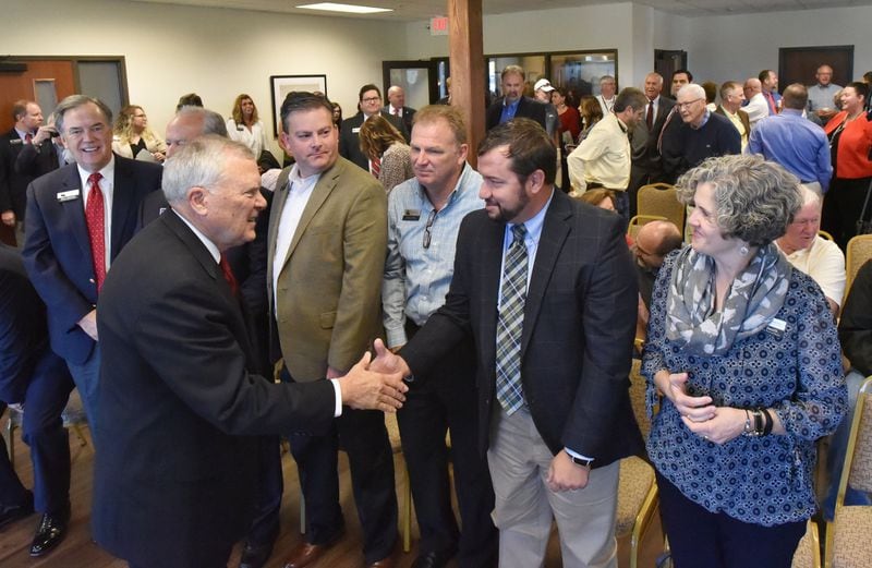 October 12, 2018 Dallas - Gov. Nathan Deal greets guests as he arrives at Silver Comet Field to formally announce plans for Chattahoochee Technical Collegeâ€™s aviation academy on Friday, October 12, 2018. Gov. Nathan Deal announced plans for a $35 million aviation academy at Paulding Countyâ€™s airport that could stymie a push by some officials to commercialize the facility. HYOSUB SHIN / HSHIN@AJC.COM