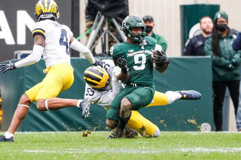 Former Michigan State standout Kenneth Walker III (9) might be the first running back off the board in the upcoming NFL draft. (Junfu Han/Detroit Free Press/TNS)