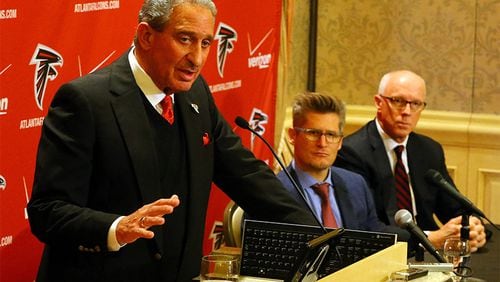 122914 ATLANTA: Falcons owner Arthur Blank (from left), GM Thomas Dimitroff and President Rich McKay take questions during a press conference following the firing of head coach Mike Smith at the Arthur M. Blank Foundation on Monday, Dec. 29, 2014, in Atlanta. Blank is leading the team's search for a replacement. Curtis Compton / ccompton@ajc.com FILE PHOTO: 122914 ATLANTA: Falcons owner Arthur Blank (from left), GM Thomas Dimitroff and President Rich McKay take questions during a press conference following the firing of head coach Mike Smith at the Arthur M. Blank Foundation on Monday, Dec. 29, 2014, in Atlanta. The team now knows how much it will cost to extend Julio Jones' contract. (Curtis Compton / ccompton@ajc.com)