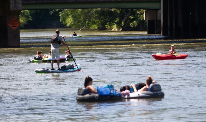 The Chattahoochee River National Recreation Area is urging swimmers to wear life vests or performance floatation devices and has installed signage in the Akers Mill park area. (Photo: Steve Schaefer for The Atlanta Journal-Constitution)