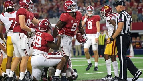 ARLINGTON, TX - SEPTEMBER 3: Bo Scarbrough #9 of the Alabama Crimson Tide walks through the end zone after scoring a touchdown against the USC Trojans in the second half during the AdvoCare Classic at AT&T Stadium on September 3, 2016 in Arlington, Texas. (Photo by Ron Jenkins/Getty Images)