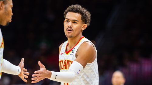 Trae Young of the Atlanta Hawks celebrates during the second half against the Cleveland Cavaliers at Quicken Loans Arena on October 21, 2018 in Cleveland, Ohio. (Photo by Jason Miller/Getty Images)