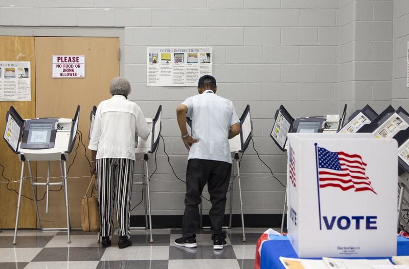 Voters cast their ballots during Saturday early voting at the C.T. Martin Natatorium and Recreation Center in Atlanta, Georgia, on Saturday, May 12, 2018. (REANN HUBER/REANN.HUBER@AJC.COM)