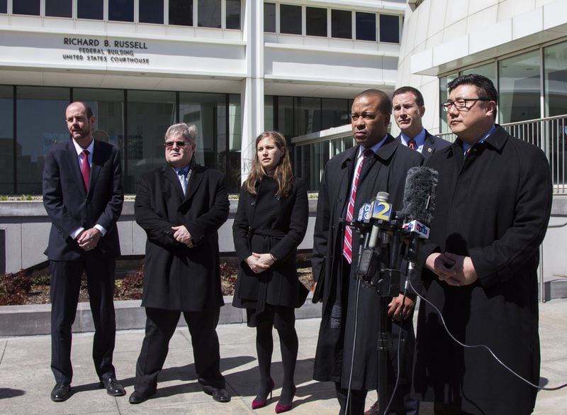 U.S. Attorney Byung “BJay” Pak, right, holds a press conference outside the Richard B. Russell Courthouse in Atlanta, Georgia, on Wednesday, March 14, 2018. Pak addressed the federal indictment of Jun Ying, a former chief information officer for a division of Equifax. Ying was accused of insider trading related to alleged sales of the company’s stock before Equifax announced a massive data breach last year. (REANN HUBER/REANN.HUBER@AJC.COM)