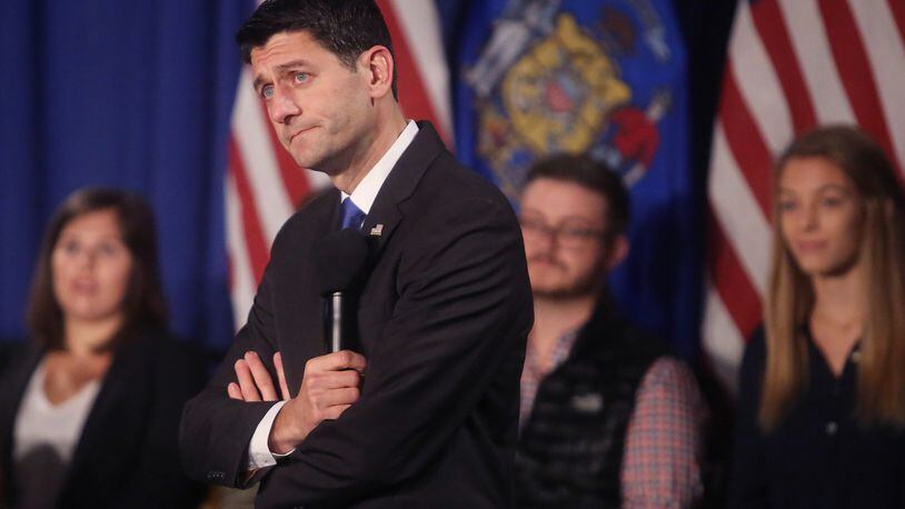 House Speaker Paul Ryan, R-Wis., listens to a question during an appearance with a group of College Republicans at the Masonic Center in Madison, Wis., Friday, Oct. 14, 2016. (John Hart/Wisconsin State Journal via AP)