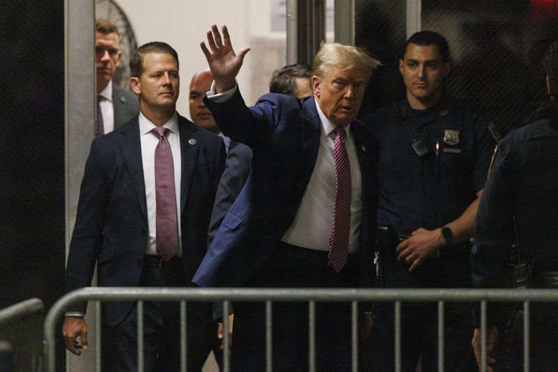 Former President Donald Trump arrives at Manhattan criminal court in New York, Friday, April 19, 2024.. (Sarah Yenesel/Pool Photo via AP)
