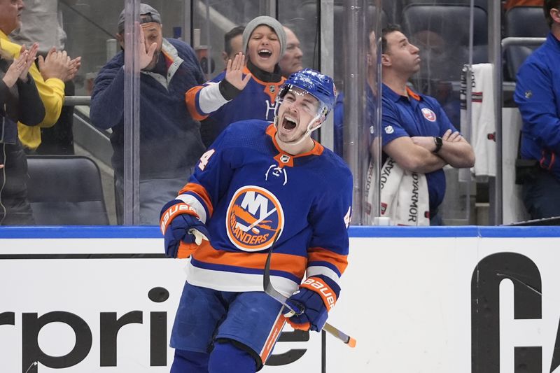 New York Islanders' Jean-Gabriel Pageau celebrates after scoring during the third period of Game 4 of an NHL hockey Stanley Cup first-round playoff series against the Carolina Hurricanes, Saturday, April 27, 2024, in Elmont, N.Y. (AP Photo/Frank Franklin II)