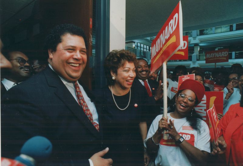Maynard Jackson and his wife Valerie smile as they leave the registration room for qualifying for the mayoral race in Atlanta in 1989. Jackson initiated a plan to bring equal opportunity for city contract awards. (Johnny Crawford/AJC staff)
