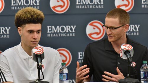 Atlanta Hawks general manager Wes Wilcox speaks as Isaia Cordinier sits next him during a press conference on Tuesday, June 28, 2016. HYOSUB SHIN / HSHIN@AJC.COM