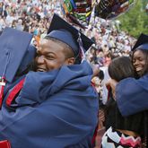 Dunwoody High School graduates celebrate after a ceremony in Chamblee. (BOB ANDRES / BANDRES@AJC.COM)