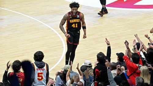 Hawks forward Saddiq Bey (41) celebrates after scoring during the first half in Game 6 of the first round of the Eastern Conference playoffs at State Farm Arena, Thursday, April 27, 2023, in Atlanta. (Hyosub Shin / Hyosub.Shin@ajc.com)