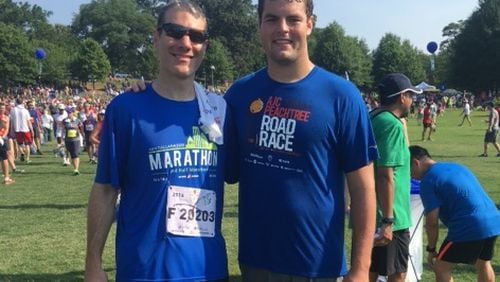 Former Georgia Tech offensive lineman Trey Braun (right) with father-in-law David DiSalvo at the 2016 AJC Peachtree Road Race. (Courtesy Trey Braun)