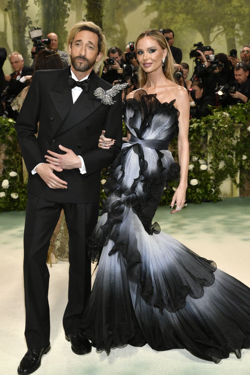 Adrien Brody, left, and Georgina Chapman attend The Metropolitan Museum of Art's Costume Institute benefit gala celebrating the opening of the "Sleeping Beauties: Reawakening Fashion" exhibition on Monday, May 6, 2024, in New York. (Photo by Evan Agostini/Invision/AP)