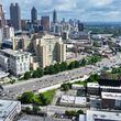 In this aerial image the Atlanta downtown skyline is seen on Wednesday, May 15, 2024. Atlanta is experiencing a population surge that outpaces other cities. (Miguel Martinez / AJC)