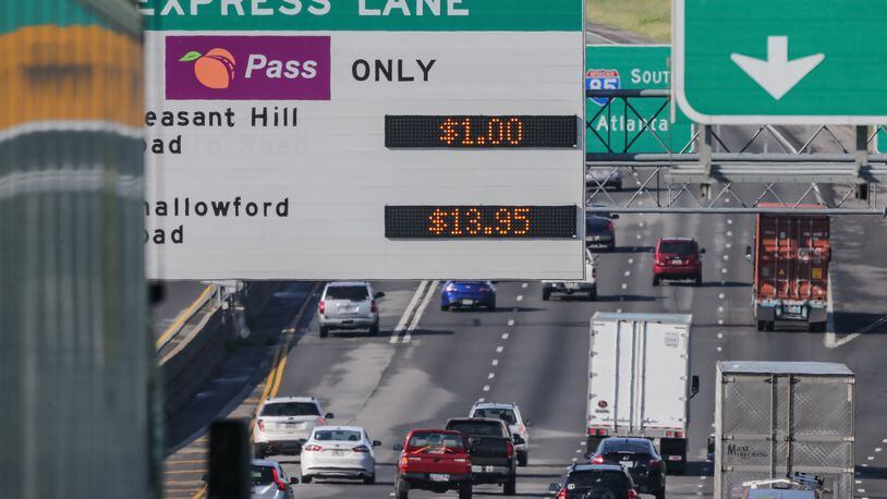 It cost drivers a record $13.95 to drive on the “HOT” express lanes on I-85 southbound in Gwinnett and DeKalb counties on Mon., Aug. 22, 2016. JOHN SPINK / JSPINK@AJC.COM