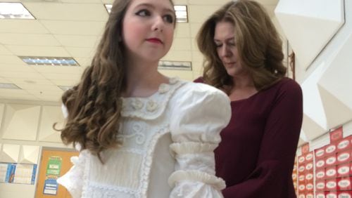 Jennifer Houlihan helps her daughter Claire getting ready for a dress rehearsal. Photo: Jennifer Brett