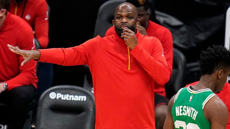 Atlanta Hawks associate head coach Nate McMillan - standing in for Lloyd Pierce - calls to his players during the second half against the Boston Celtics, Wednesday, Feb. 17, 2021, in Boston. (Charles Krupa/AP)