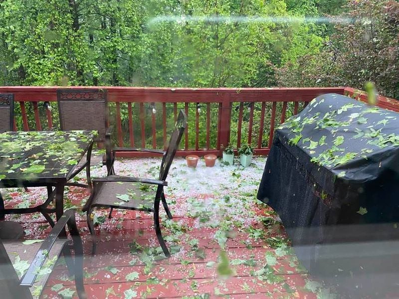 Hail piles up on a deck at an East Point residence on Saturday, April 24, 2021. (Photo: Eric Stirgus/Atlanta Journal-Constitution)