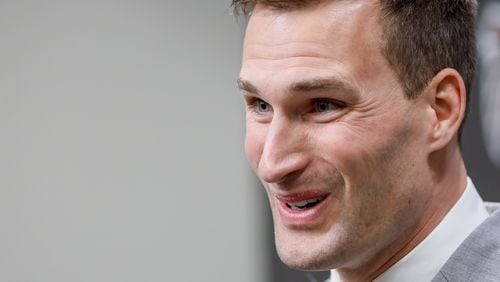 Atlanta Falcons quarterback Kirk Cousins smiles as he answers questions during his introductory press conference at the Falcons practice facility in Flowery Branch on Wednesday, March 13, 2024.
Miguel Martinez/miguel.martinezjimenez@ajc.com