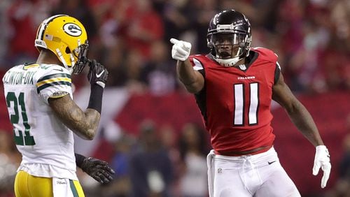 Falcons' Julio Jones signals a first down in the third quarter against the Green Bay Packers in the NFC Championship Game at the Georgia Dome on Jan.  22, 2017, in Atlanta.