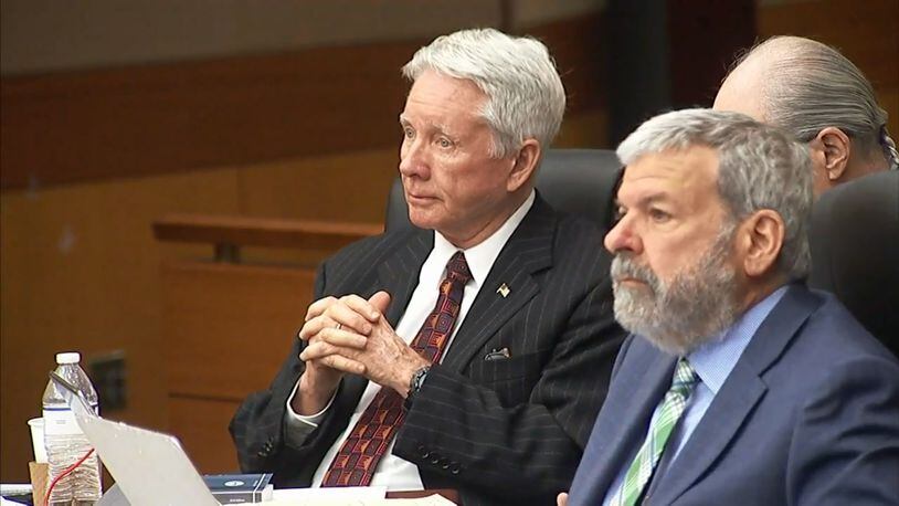 Tex McIver, at left, listens during his murder trial along with famed Atlanta defense attorney Don Samuel, right. (Channel 2 Action News)