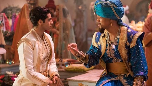 Mena Massoud, left, and Will Smith star in “Aladdin.” Daniel Smith, Walt Disney Pictures