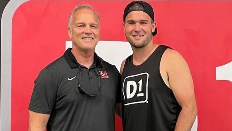 Mark and Jon Richt pose at a gym they opened recently.