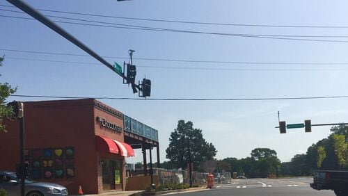 Sandy Springs and the Georgia Department of Transportation are working together on a $1.39 million project to install “SCOOT” adaptive traffic signals at 30 intersections around the city. AJC FILE