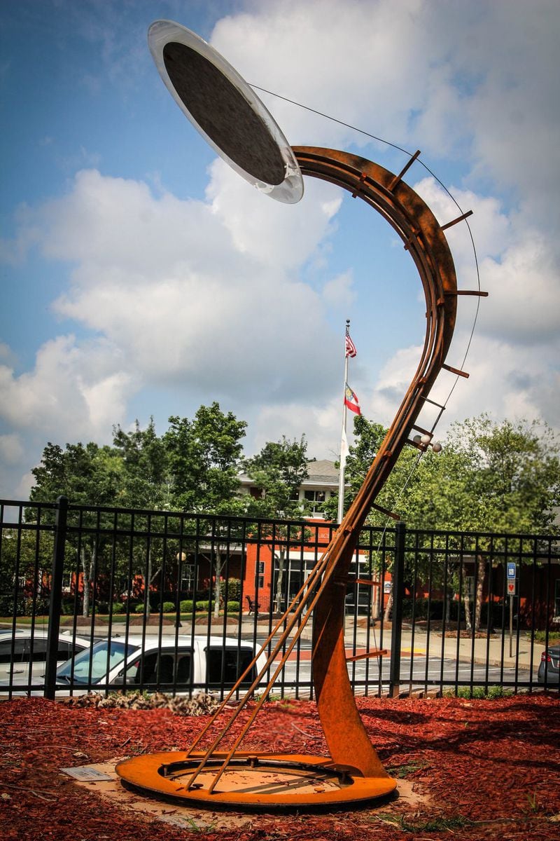 Suwanee artist Drew Dylan created a sculpture of a total solar eclipse, which is on display in a local park. CONTRIBUTED BY PAUL BARA / CITY OF SUWANEE