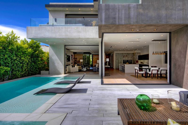 Winter Olympics star Lindsey Vonn is seeking $3.795 million for her contemporary home in the Beverly Grove neighborhood. Built last year, the two-story house has a glass-enclosed entry, floating staircase and pocketing glass doors. Front and rear terraces and a saltwater swimming pool invite outdoor entertaining. (Lucas On Location)