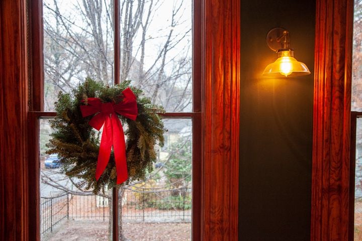 Photos: Victorian-style home displays 19th century character, colorful Christmas decorations